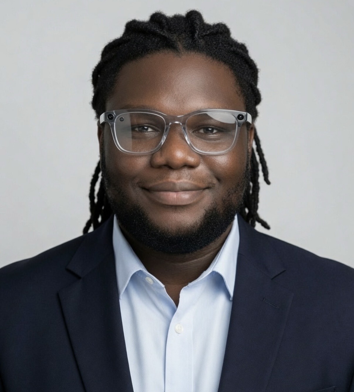 David Ikechukwu — Founder & CEO of PingMart David Ikechukwu — Nigerian tech entrepreneur, Founder and CEO of PingMart, photographed in a navy suit